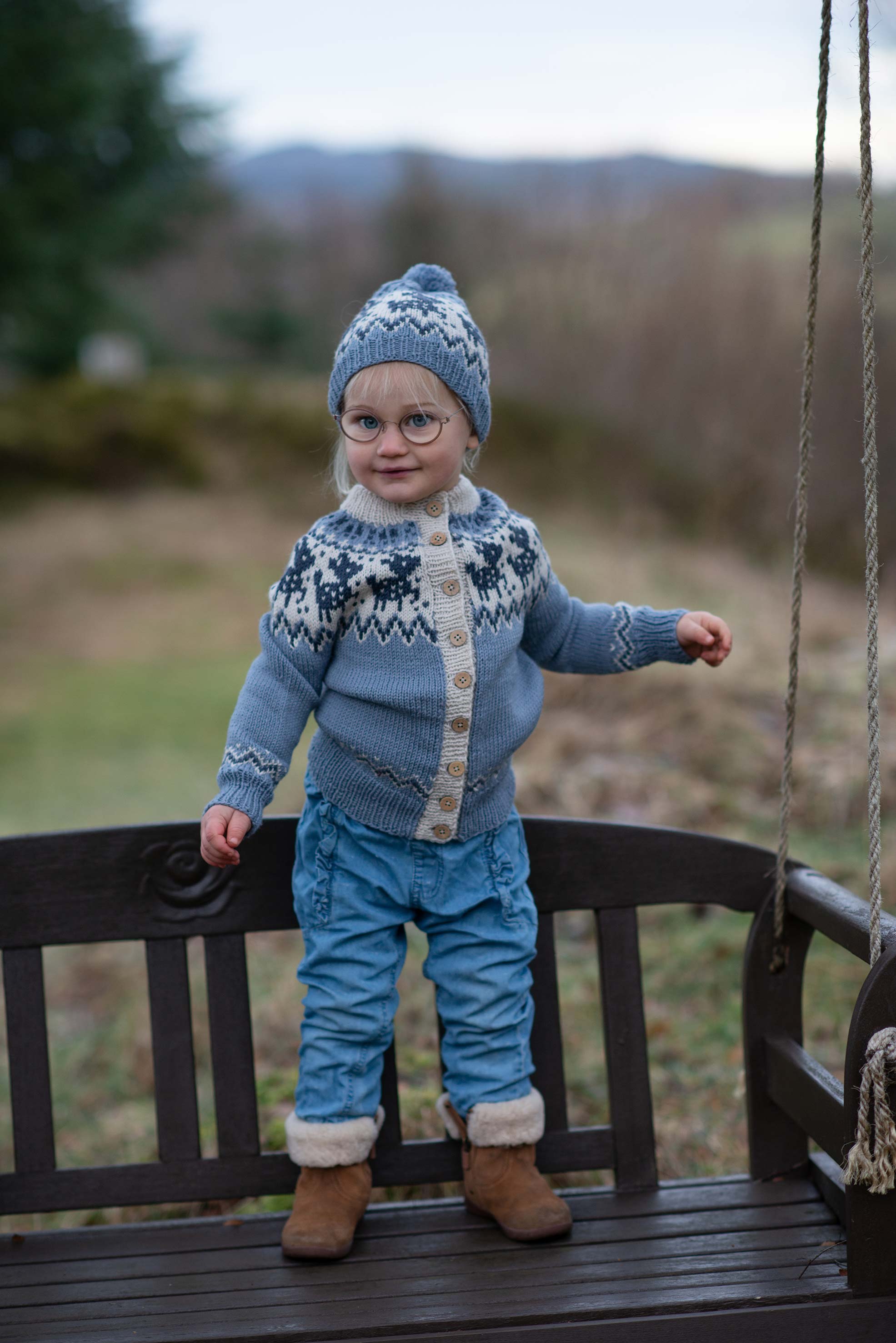 Fauna jacka och mössa ljus blå