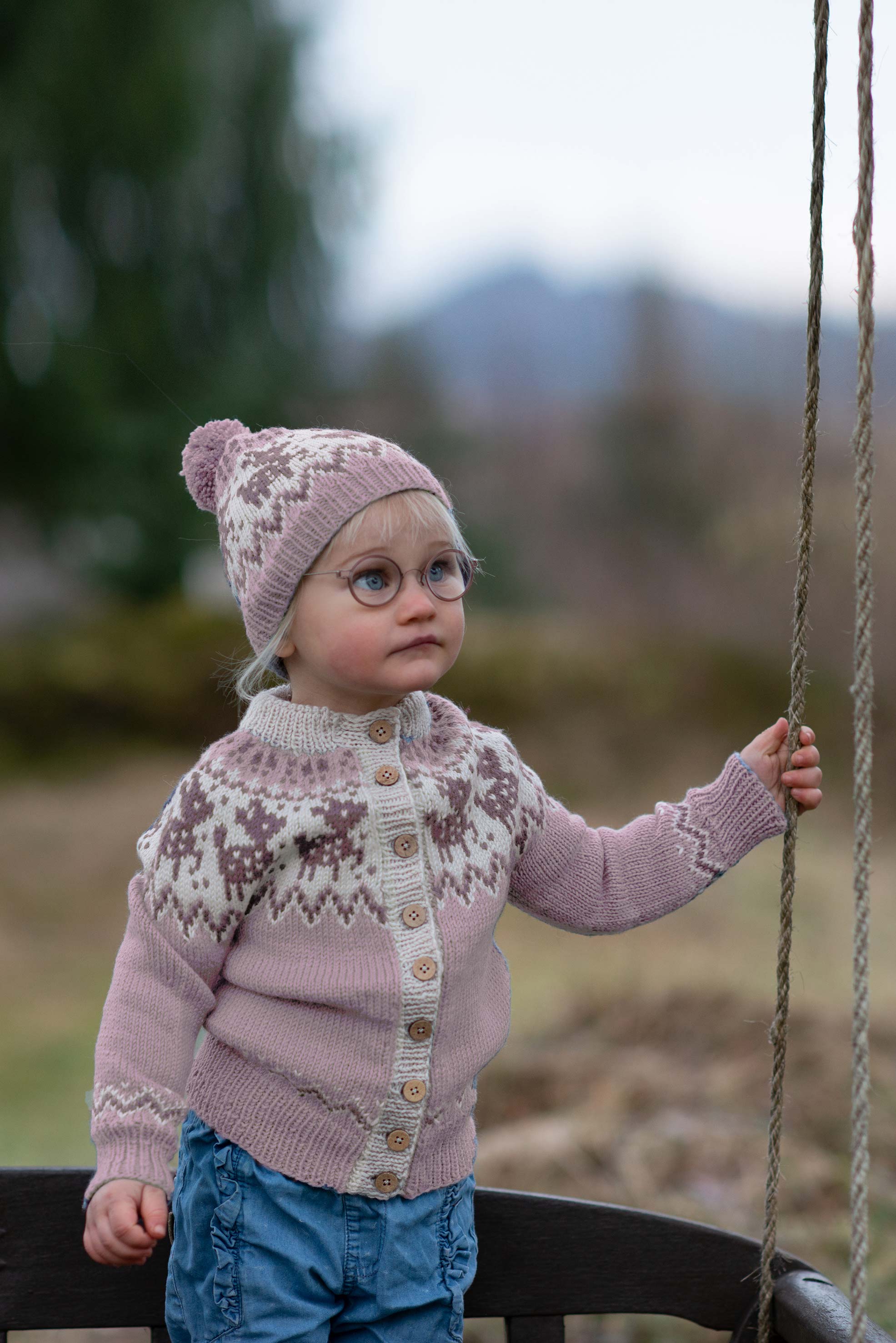 Fauna jacka och mössa puderrosa