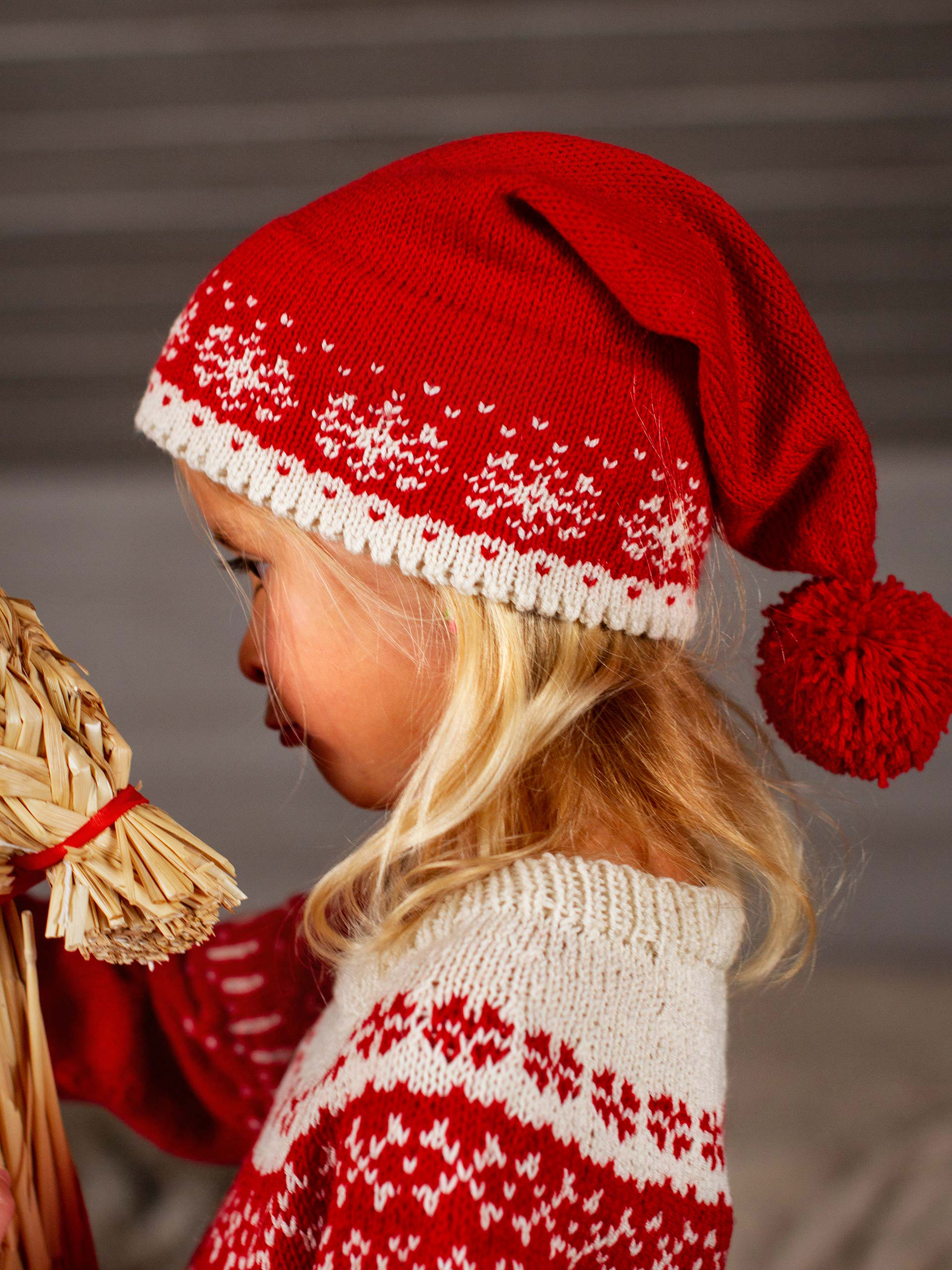 STJÄRNFALL tomteluva röd/kitt