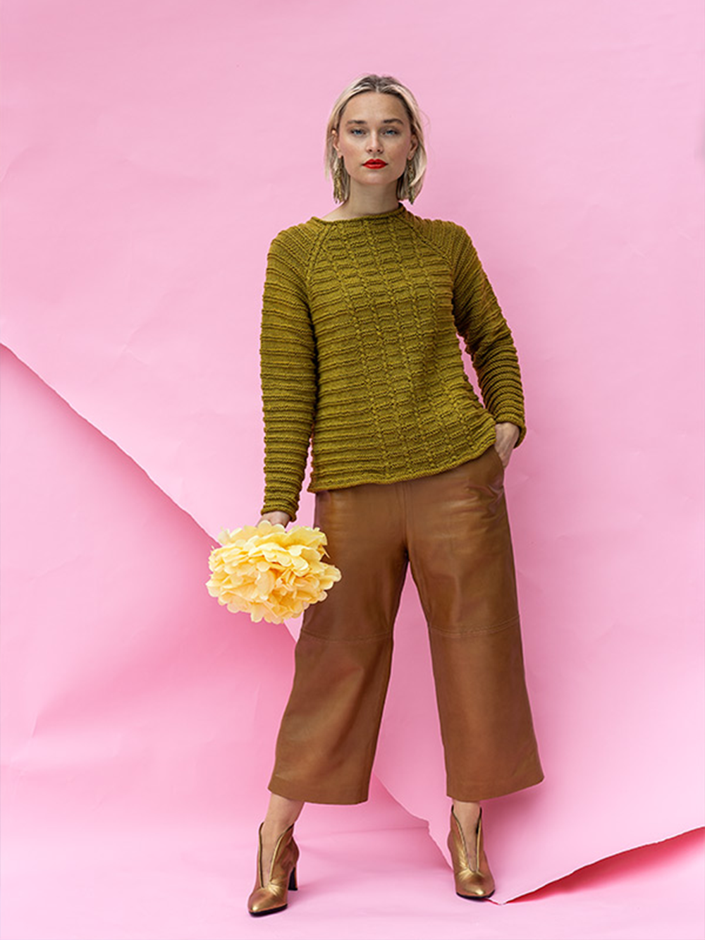 Tröja med flätor och öppen rätstickning