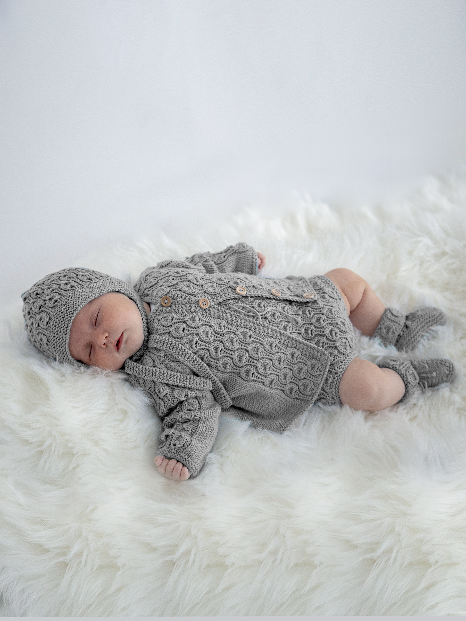 Vugge rompersett grå