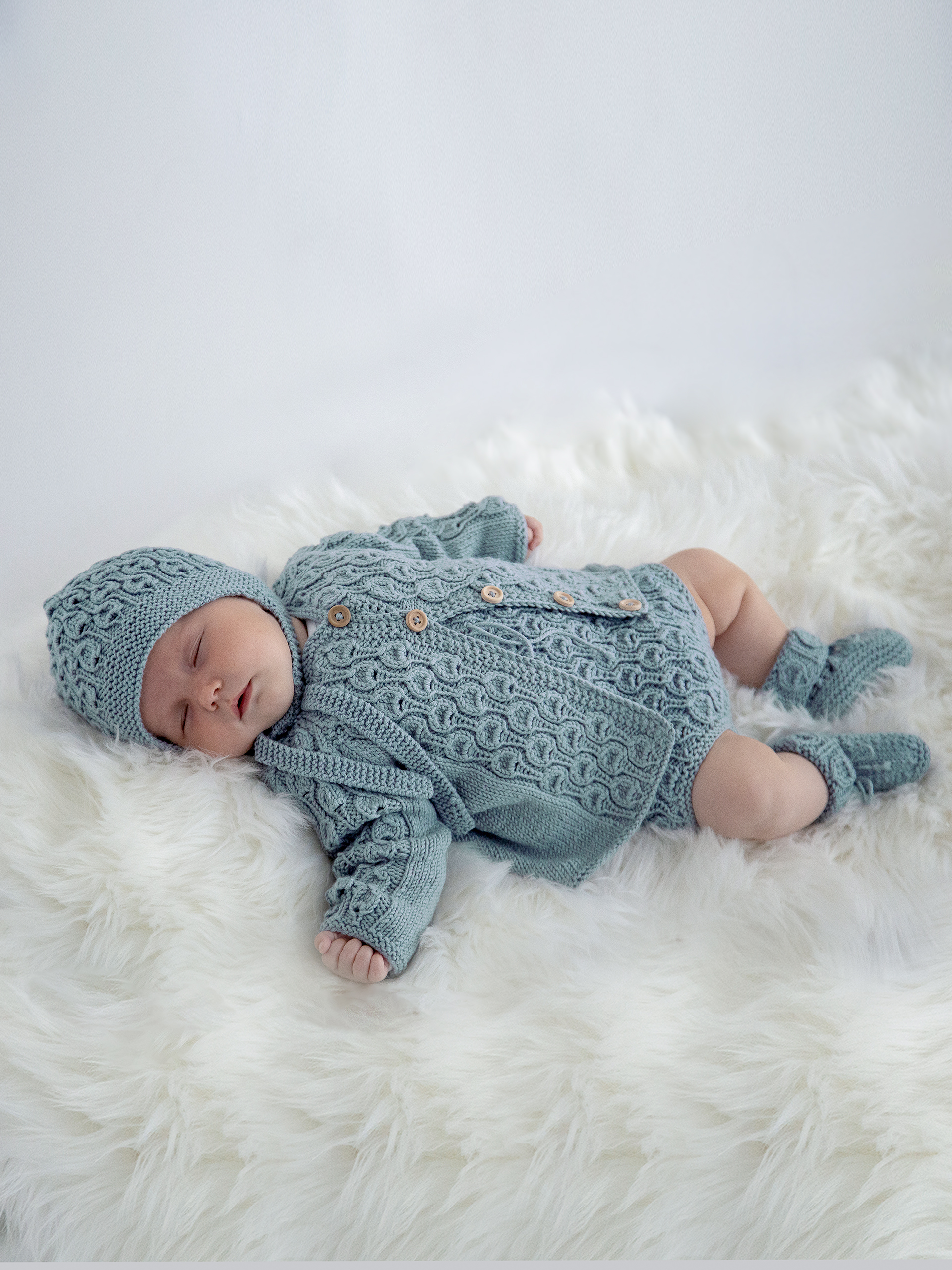 Vugge rompersett ljus petrol